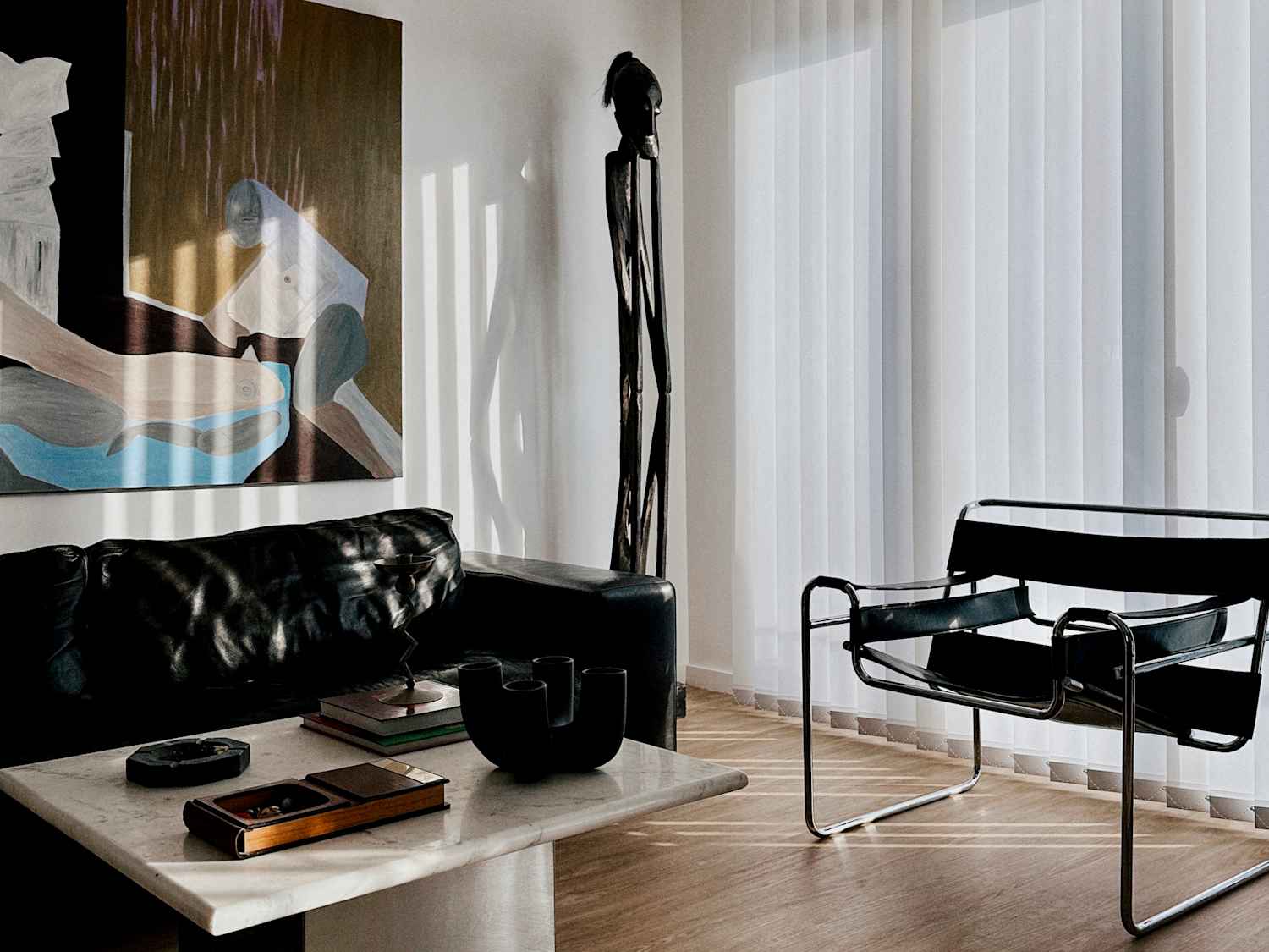 Tour a Calm, Small Paris Apartment with Light & Modern Art